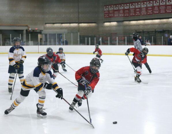 girls playing hockey